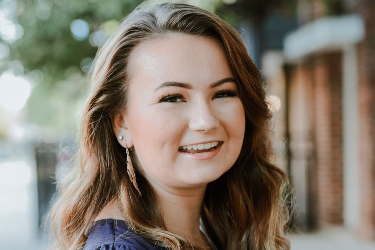 Head shot of young  smiling girl.