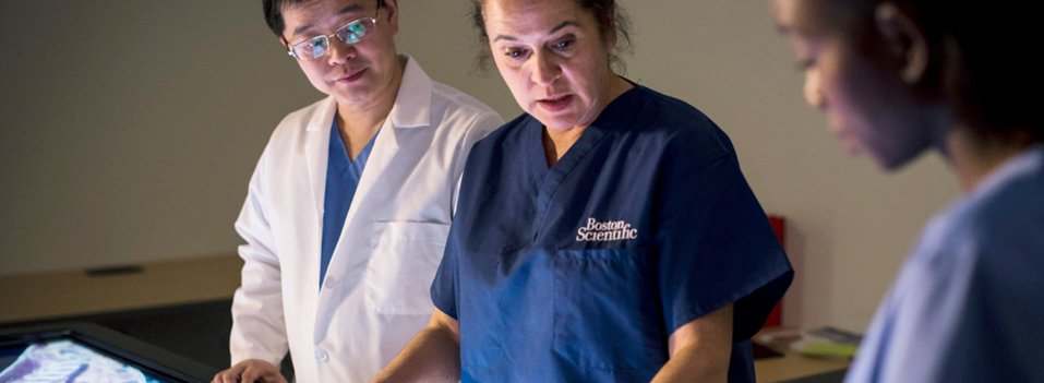 Three doctors working in an office